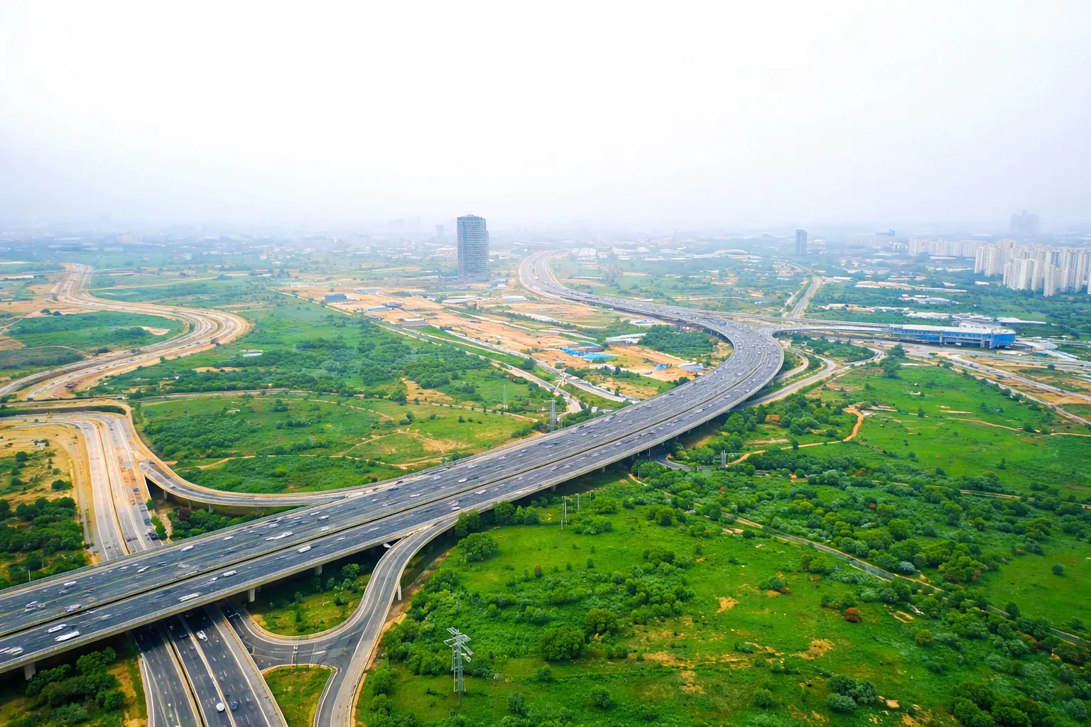 Dholera Expressway postponed update displaying world-class road infrastructure near Dholera SIR